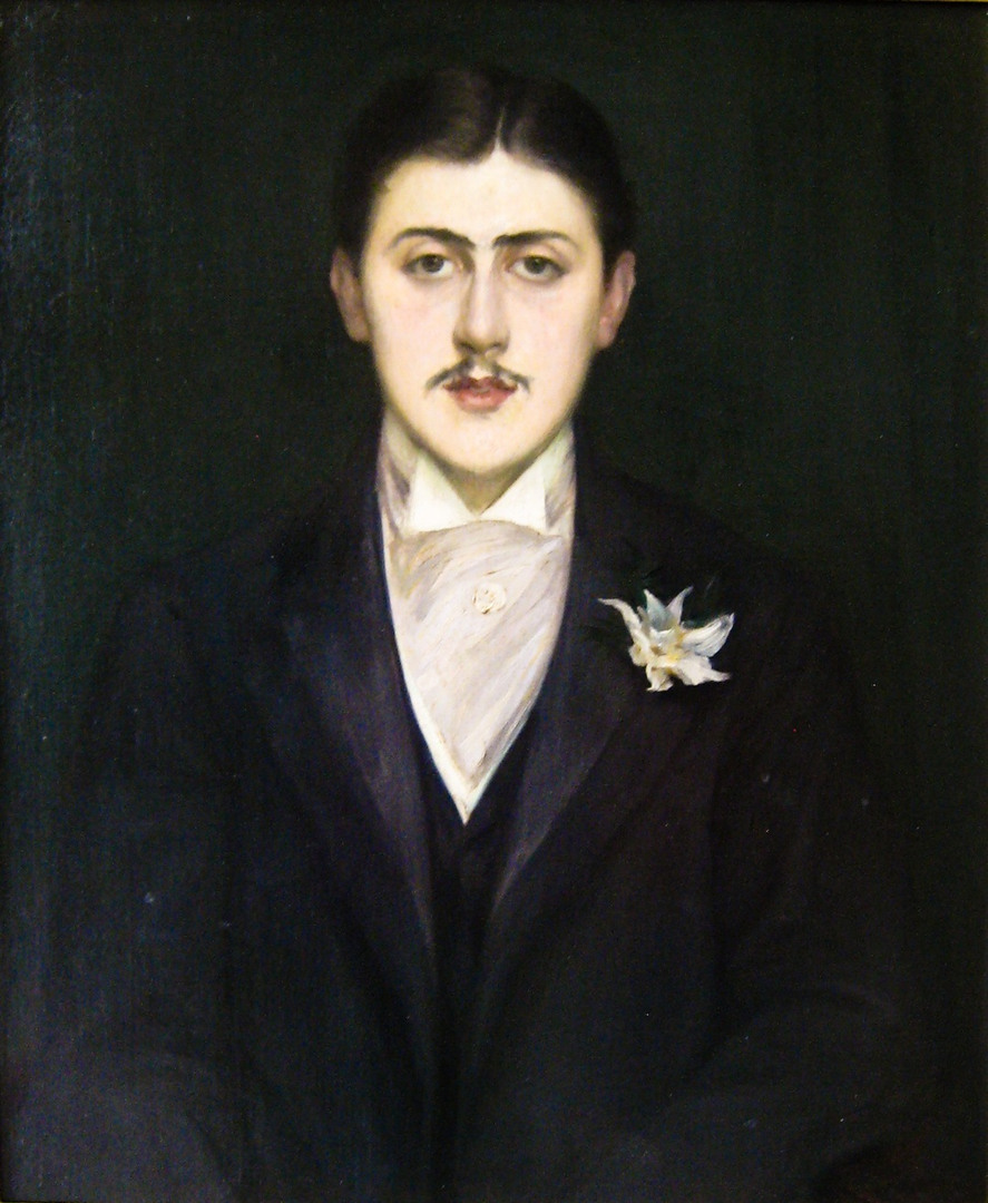 Portrait of Marcel Proust in a dark suit with a white flower in his buttonhole